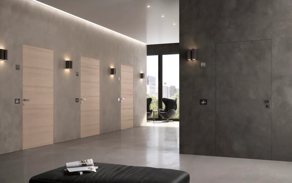 Moderne wandbündige Türen mit minimalistischer Beton-Optik im exklusiven Interior